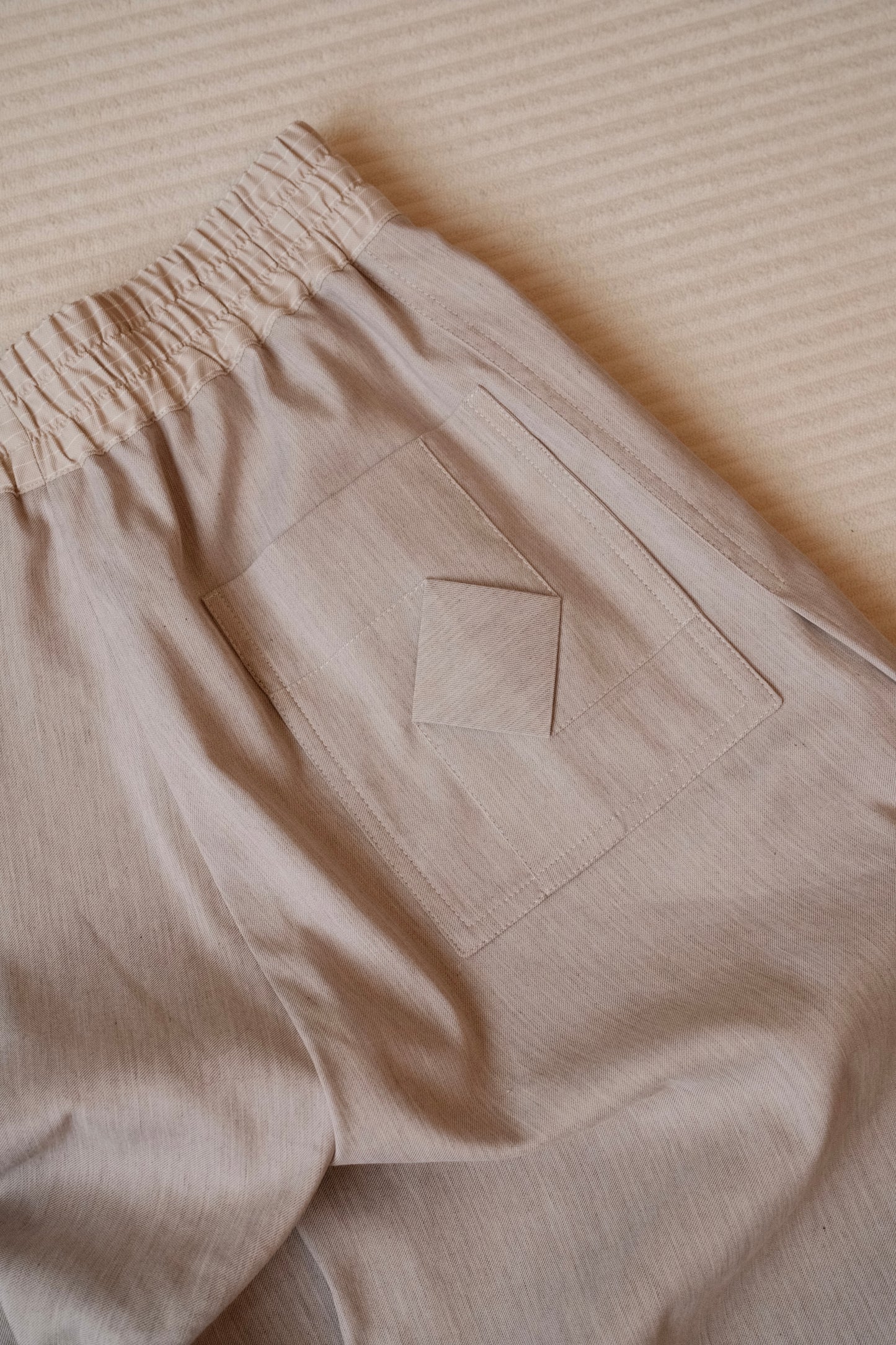 Unisex Pleated Cocoon Pants in Griege